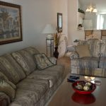 Curl up on the couch and watch your favorite shows on the big screen tv in  your furnished apartment in Panama City Beach.